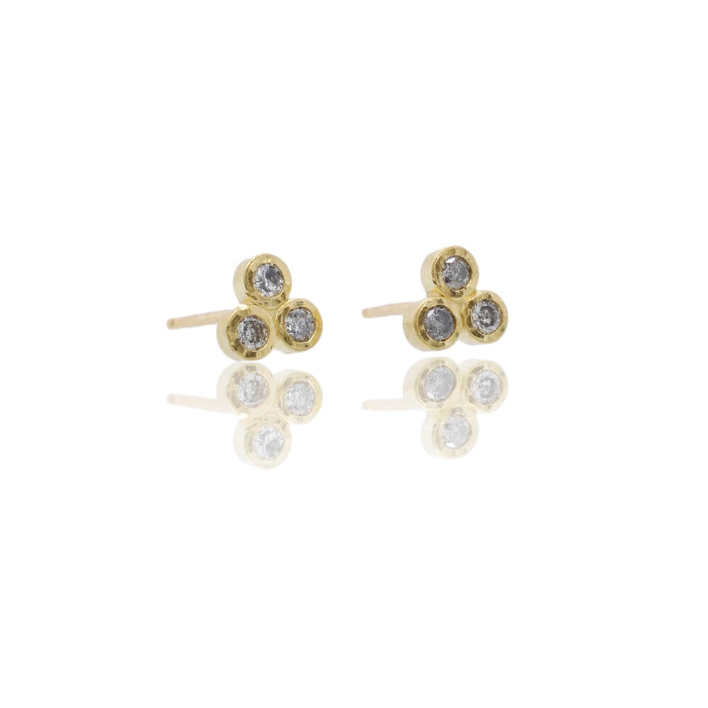 Salt and pepper diamond stud earrings in yellow gold. Handmade by EC Design Studio in Minneapolis, MN using recycled metal and conflict-free stones.