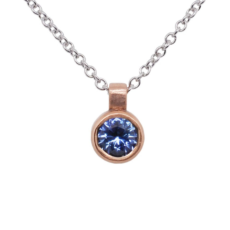 Blue Sapphire and Rose Gold Bezel Set Necklace