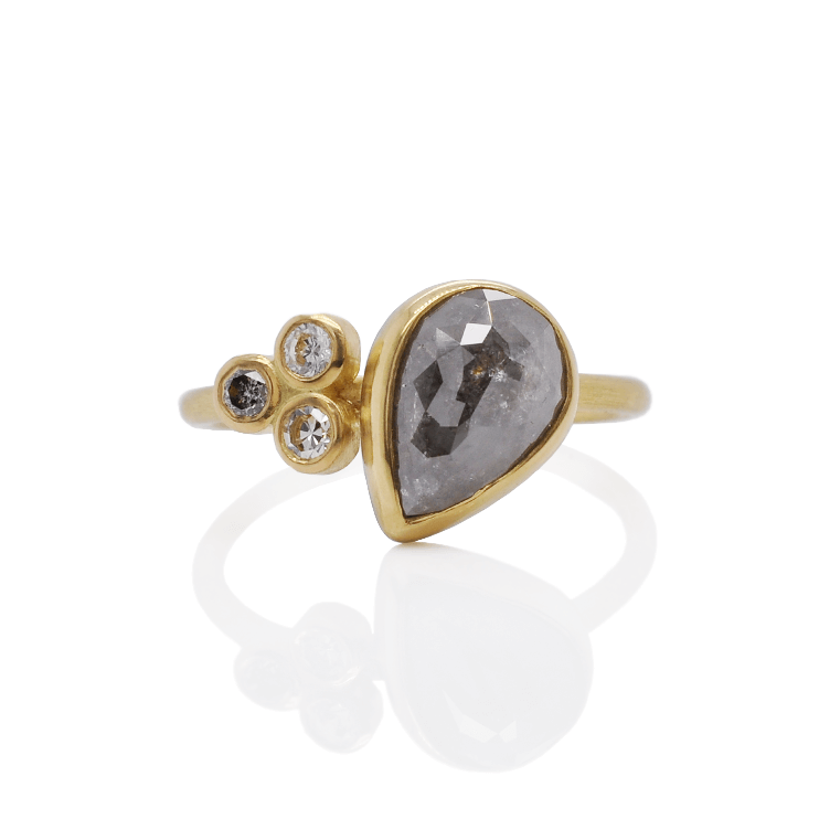 Gray teardrop cluster ring in yellow gold with mixed diamond accents.