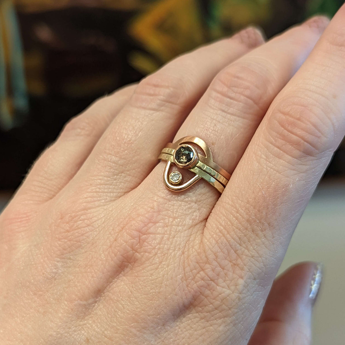 Ring stack with chocolate diamond, arch band, and diamond arch ring.