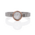 Rose cut white diamond bezel set in rose gold on a linear hammered band of palladium.