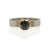 Round brilliant black Moissanite engagement ring in palladium with an open 'V' bezel made of rose gold. Handmade by EC Design Jewelry in Minneapolis, MN.