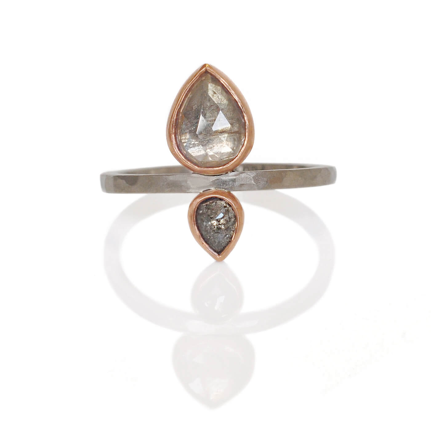 Soft gray sapphire and ice gray diamond set in red gold on a hammered palladium band. Handmade by EC Design Studio in Minneapolis, MN using recycled metal and conflict-free stones.