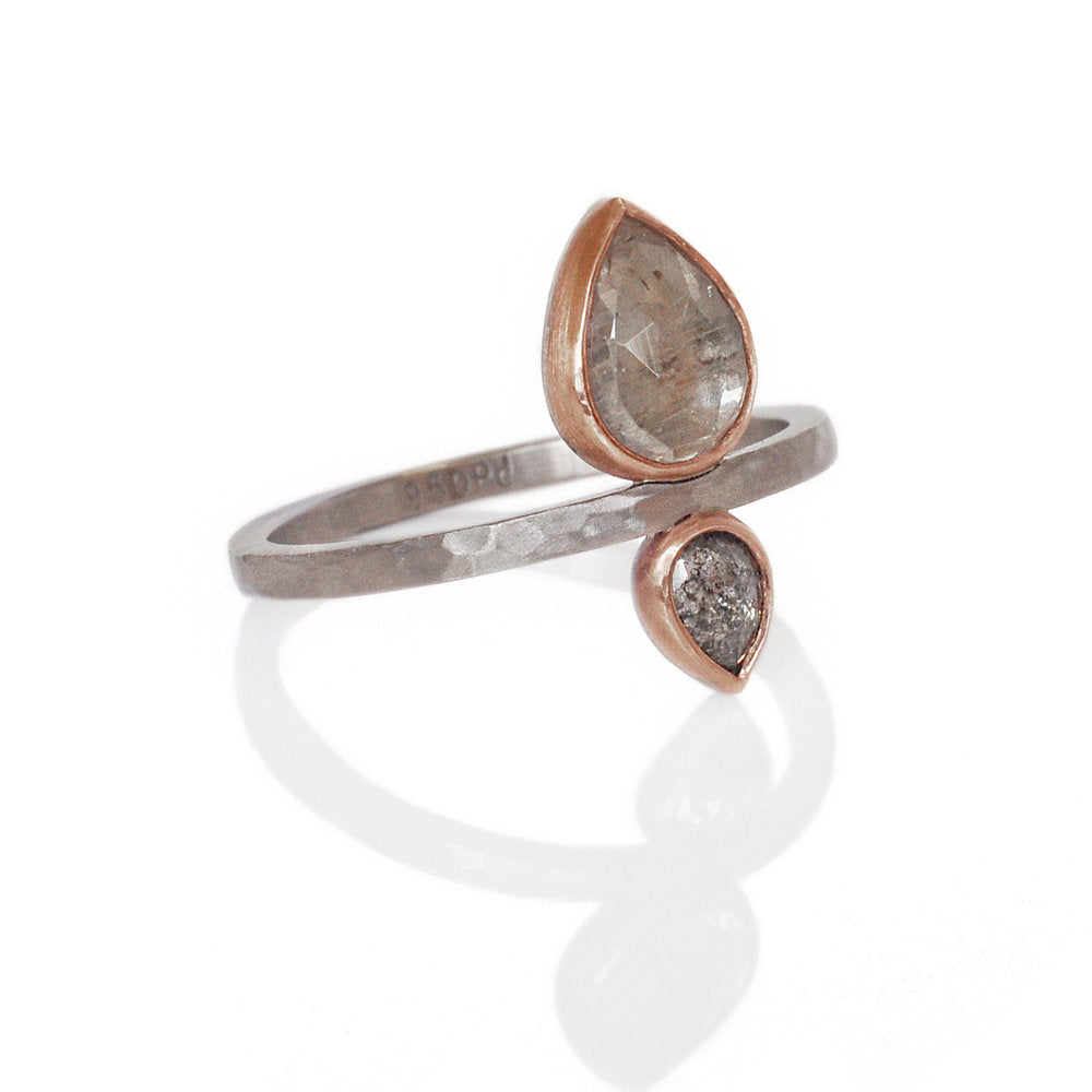 Soft gray sapphire and ice gray diamond set in red gold on a hammered palladium band. Handmade by EC Design Studio in Minneapolis, MN using recycled metal and conflict-free stones.