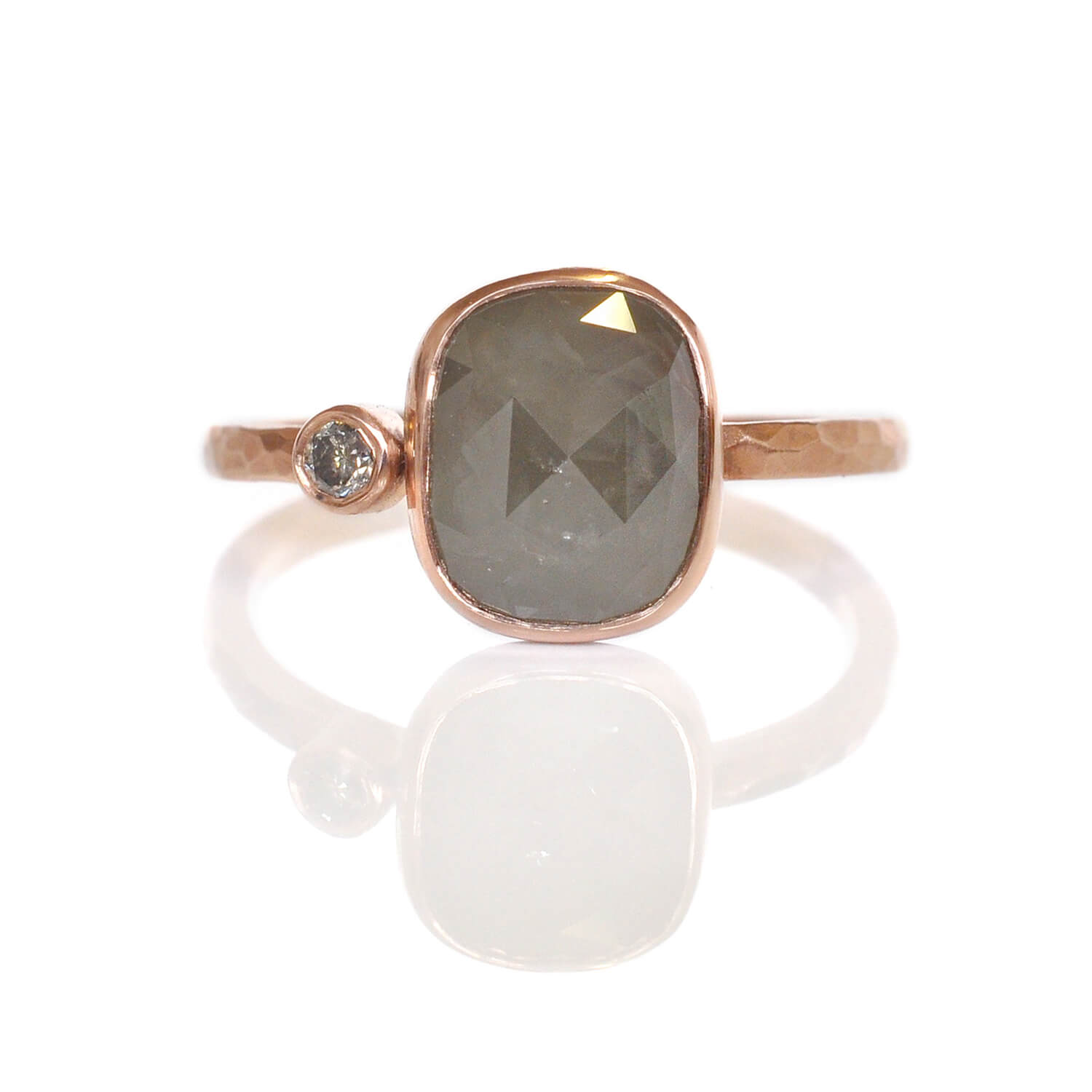 Modern engagement ring with gray rose cut diamond in red gold and a champagne diamond accent. Handmade by EC Design Jewelry in Minneapolis, MN using recycled metal and conflict-free stones.
