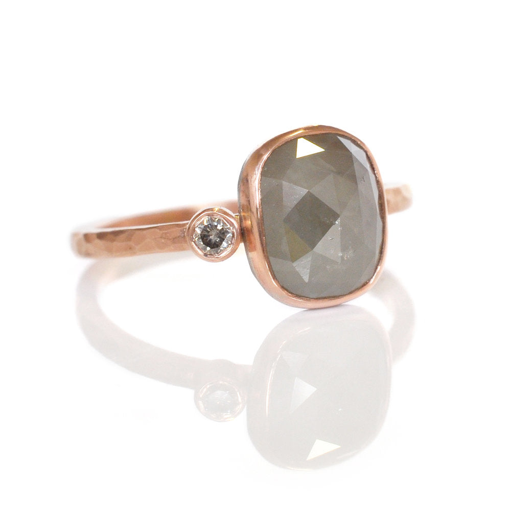 Modern engagement ring with gray rose cut diamond in red gold and a champagne diamond accent. Handmade by EC Design Jewelry in Minneapolis, MN using recycled metal and conflict-free stones.
