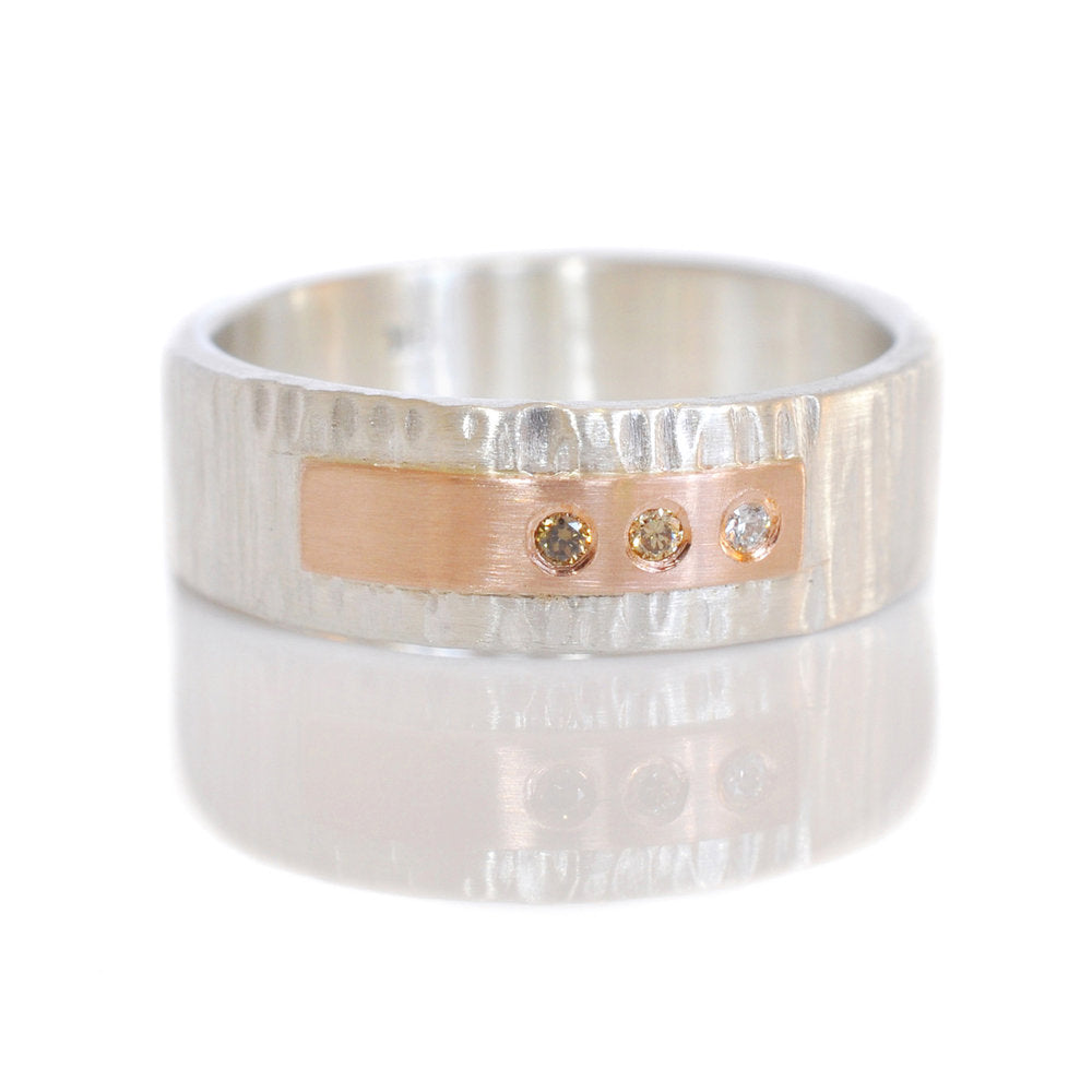 Linear hammered sterling silver band with red gold and mixed diamond accents. Handmade by EC Design Jewelry in Minneapolis, MN using recycled metal and conflict-free stones.