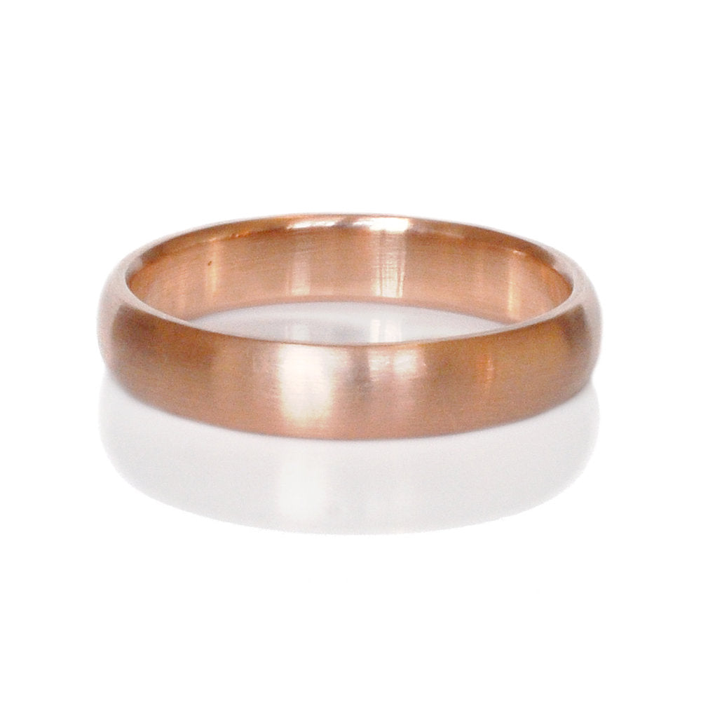 Low dome band in 14k rose gold. Handmade by EC Design Jewelry in Minneapolis, MN using recycled metal.