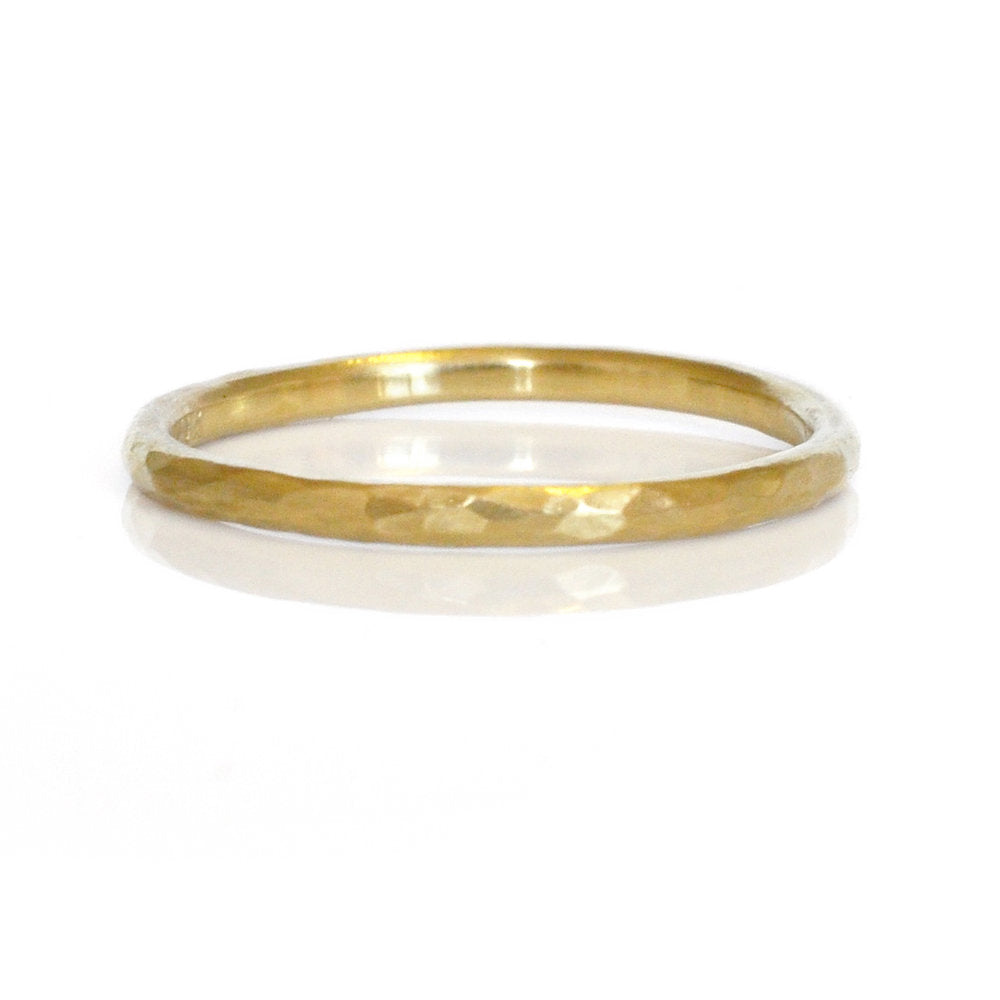Hammered 18k yellow gold wedding band. Handmade by EC Design Jewelry in Minneapolis, MN using recycled metal.