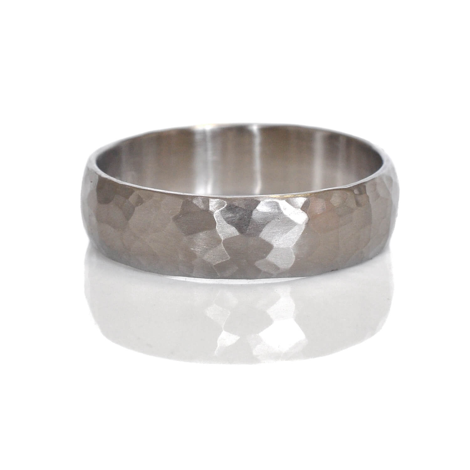 Handmade hammered palladium wedding band. Made by EC Design Jewelry in Minneapolis, MN.