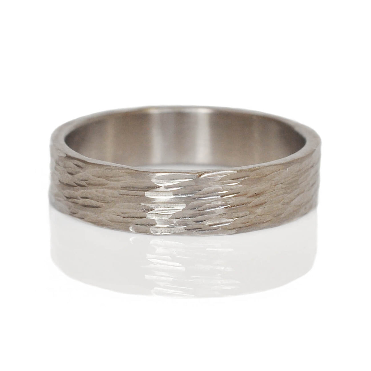 Chiseled band in palladium. Handmade by EC Design Jewelry in Minneapolis, MN using recycled metal.