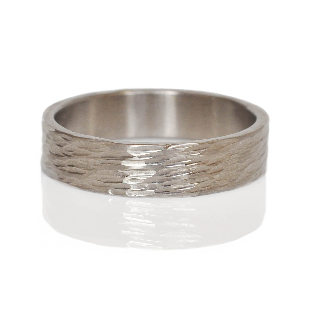 Chiseled band in palladium. Handmade by EC Design Jewelry in Minneapolis, MN using recycled metal.