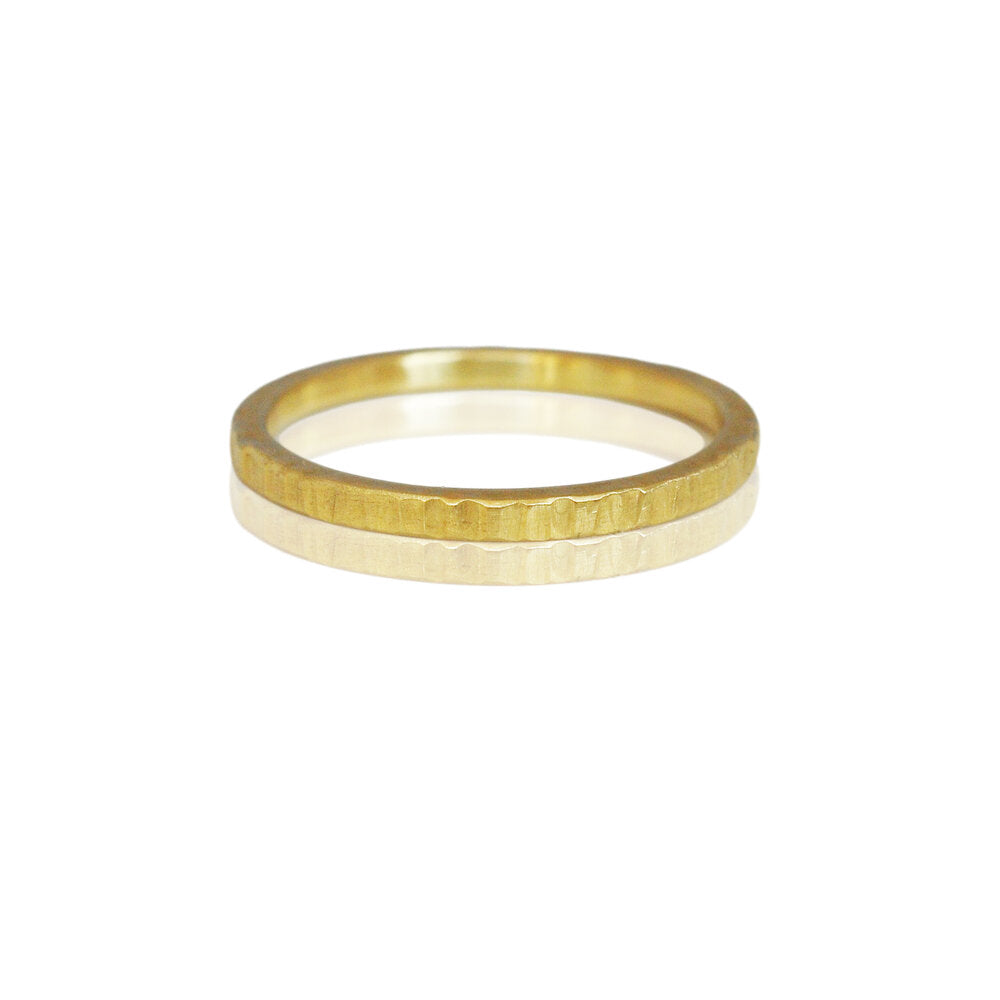 Linear hammered 18k yellow gold stacking band. Handmade by EC Design Studio in Minneapolis, MN using recycled metal.