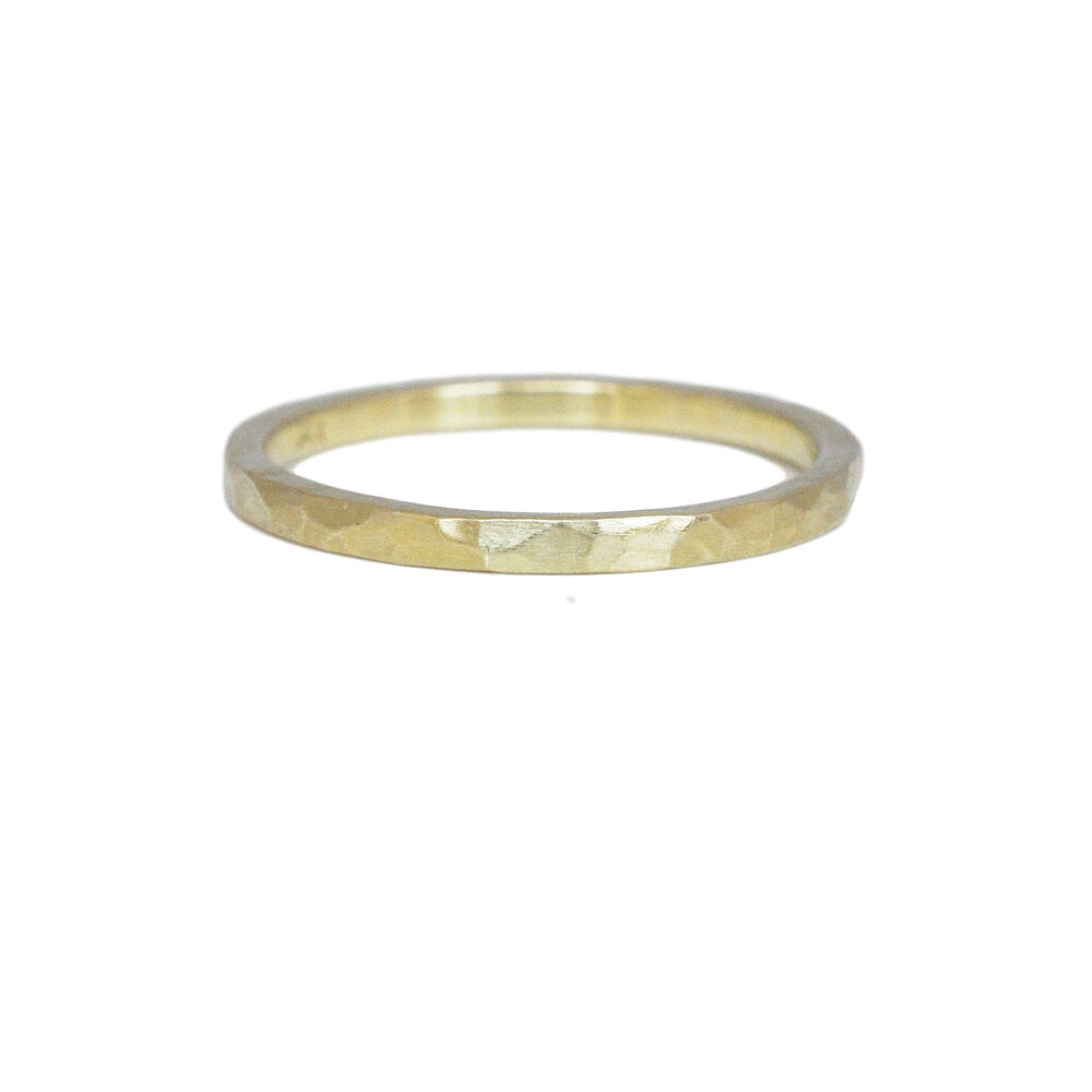 Hammered wedding band in green gold. Handmade by EC Design Studio in Minneapolis, MN.