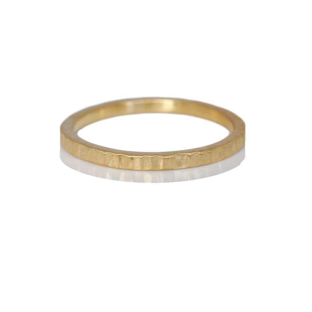 Linear hammered yellow gold wedding band. Handmade by EC Design Studio in Minneapolis, MN using recycled metal.