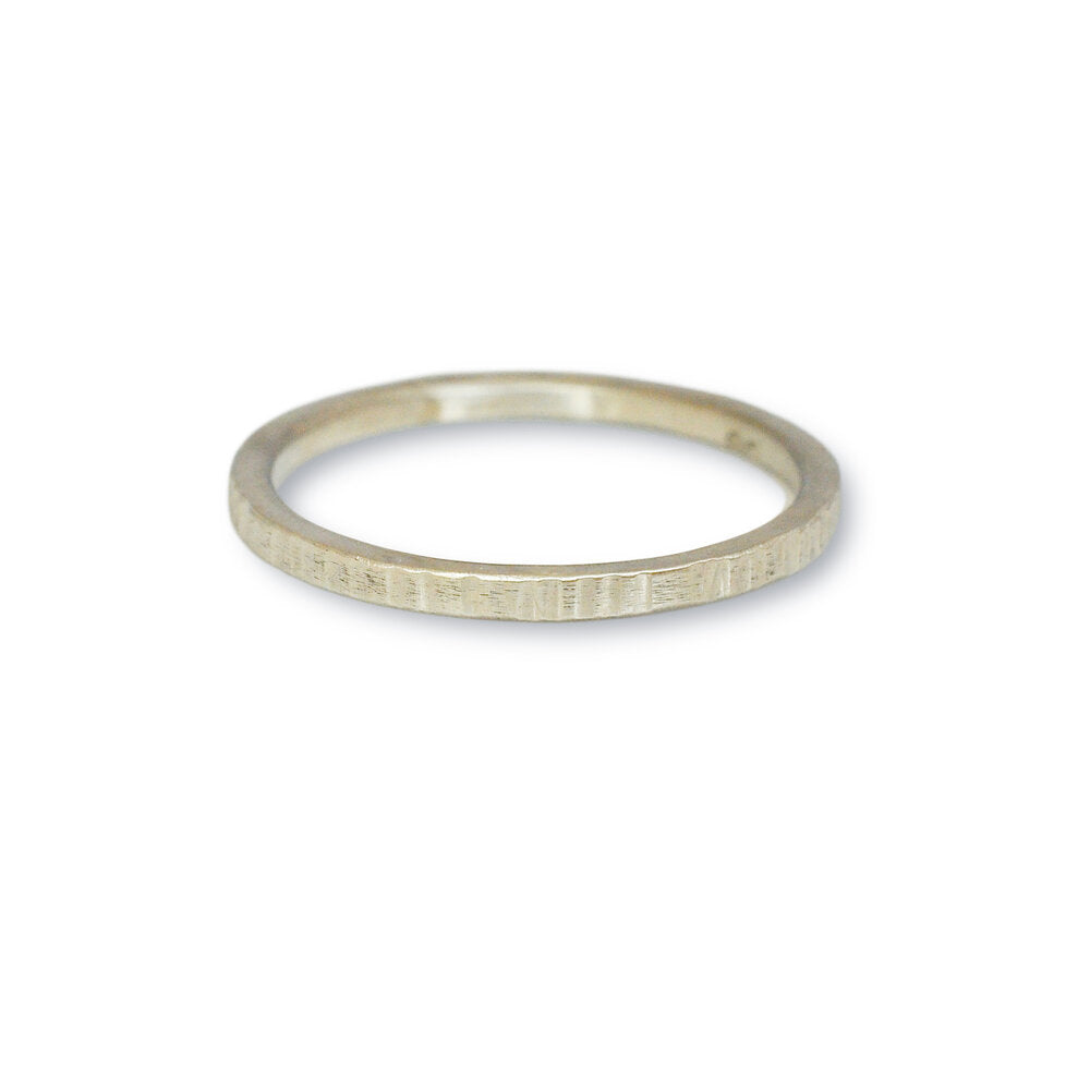 Linear hammered wedding band in 950 platinum. Handmade with recycled metal  by EC Design Studio in Minneapolis, MN. 