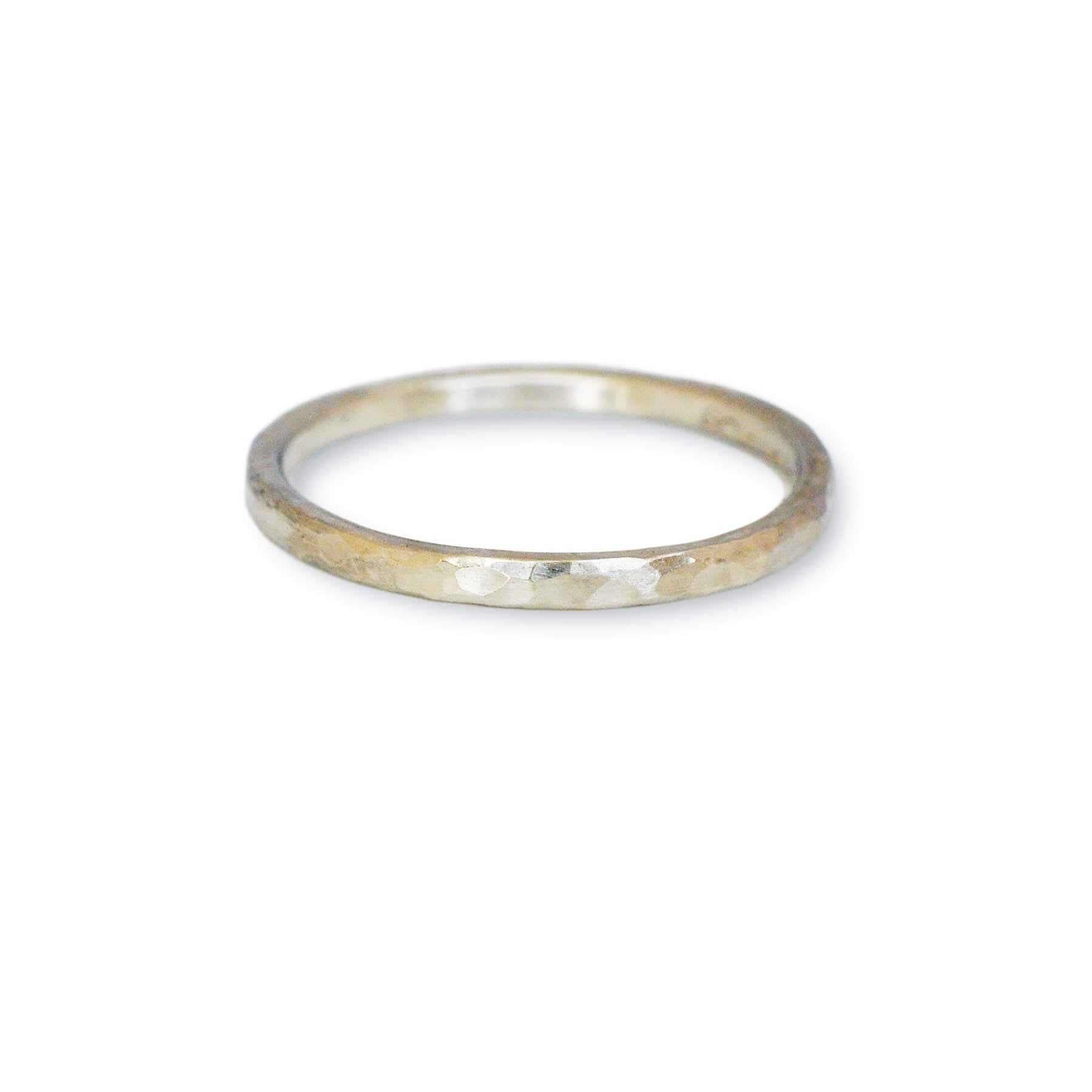 Hammered wedding band in 950 platinum. Handmade with recycled metal  by EC Design Studio in Minneapolis, MN.