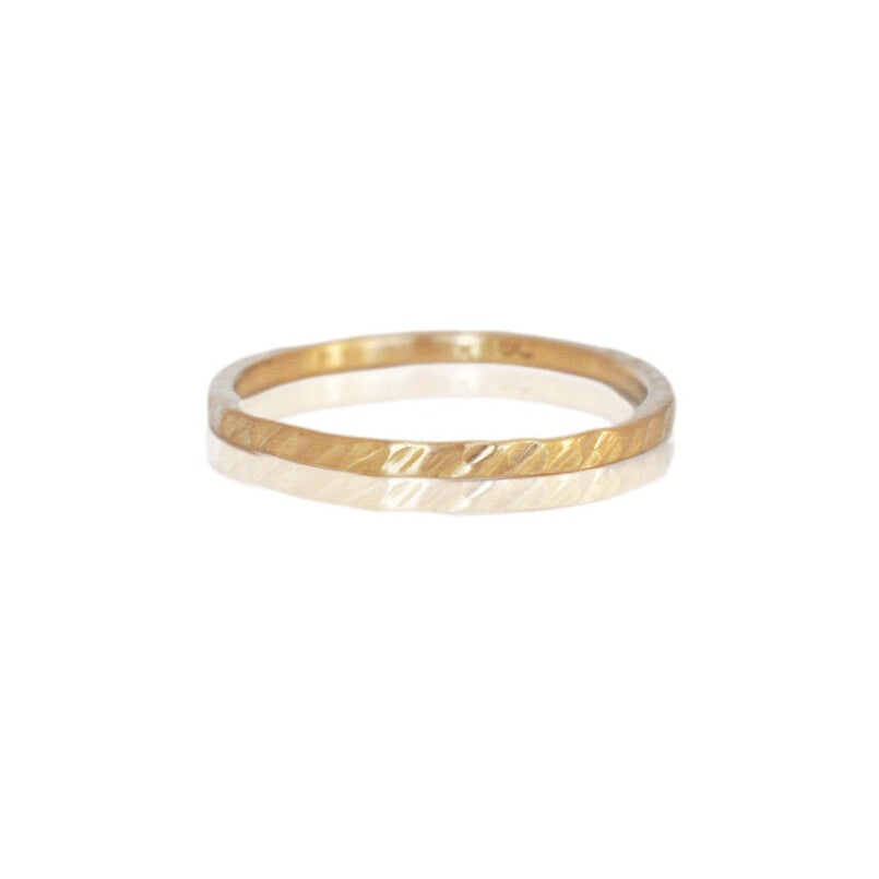 Hammered 14k yellow gold band. Handmade with recycled metal by EC Design Studio in Minneapolis, MN.