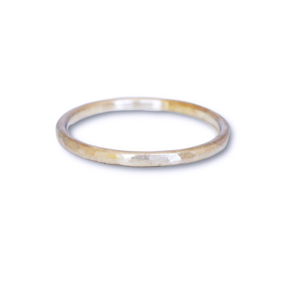 Hammered platinum wedding band. Handmade by EC Design Studio in Minneapolis, MN using recycled metal.