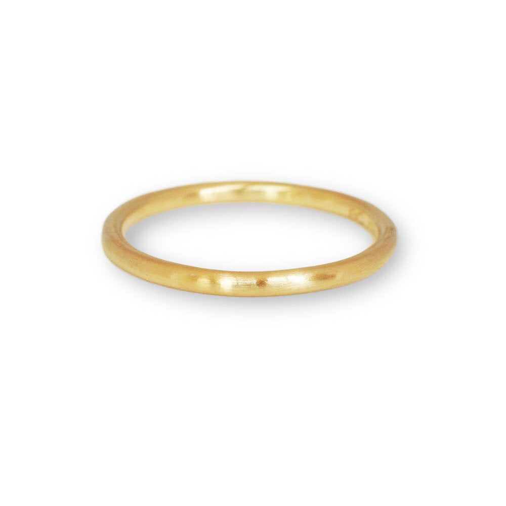 Yellow gold wedding band. Handmade by EC Design Studio in Minneapolis, MN using recycled metal.