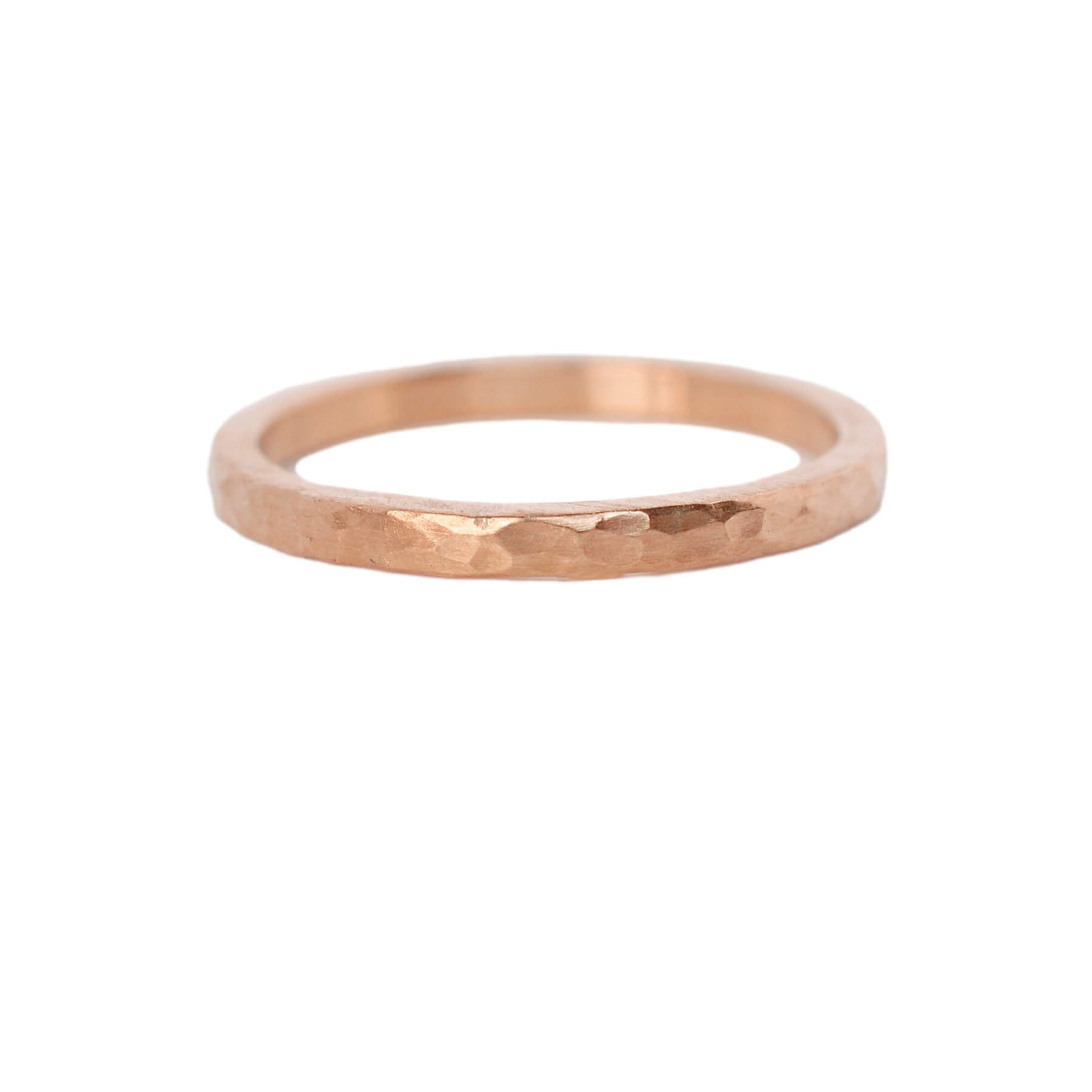 Hammered stacking band in rose gold. Handmade by EC Design Jewelry in Minneapolis, MN using recycled metal.