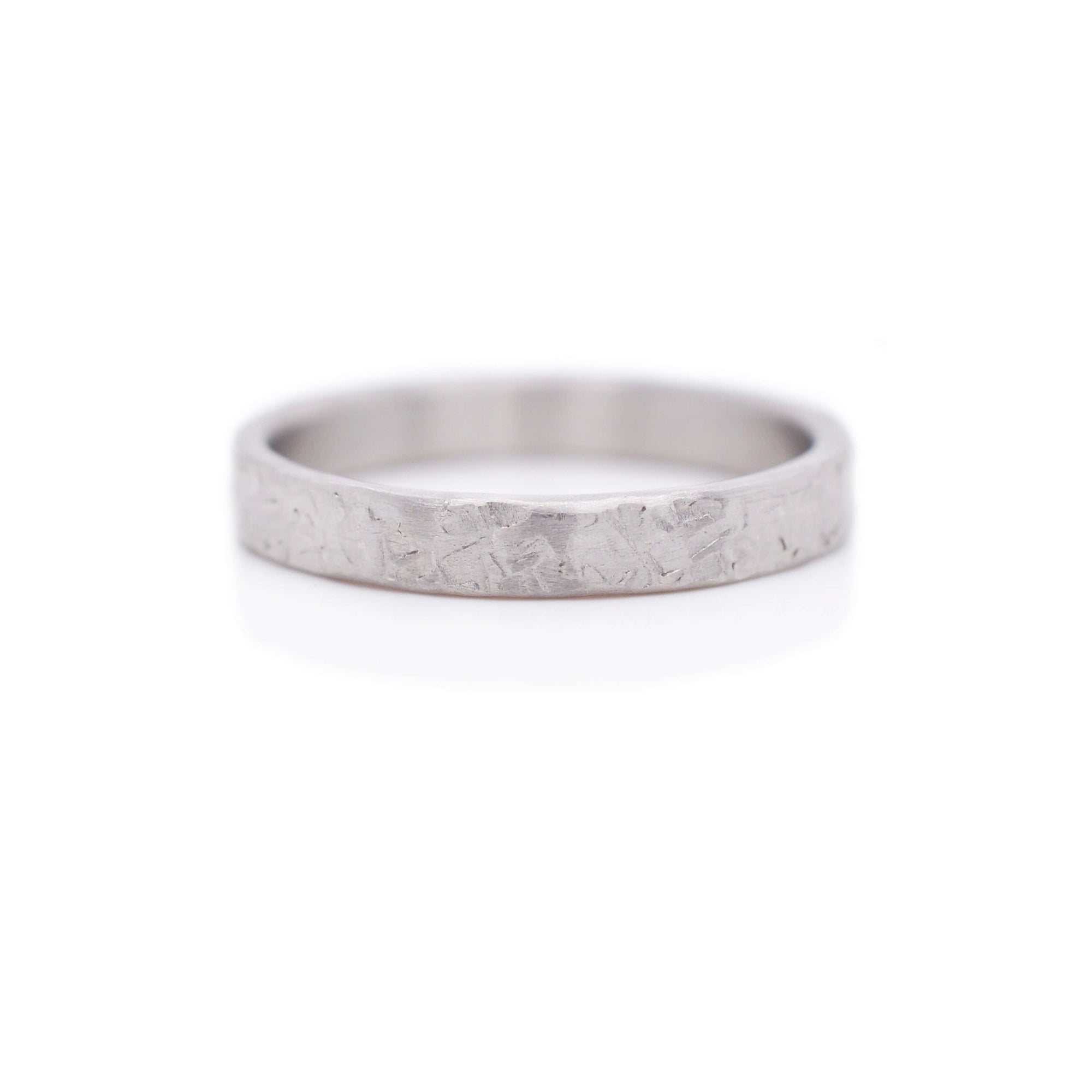 Hammered platinum wedding band. Handmade with recycled metal. EC Design Jewelry, Minneapolis, MN.