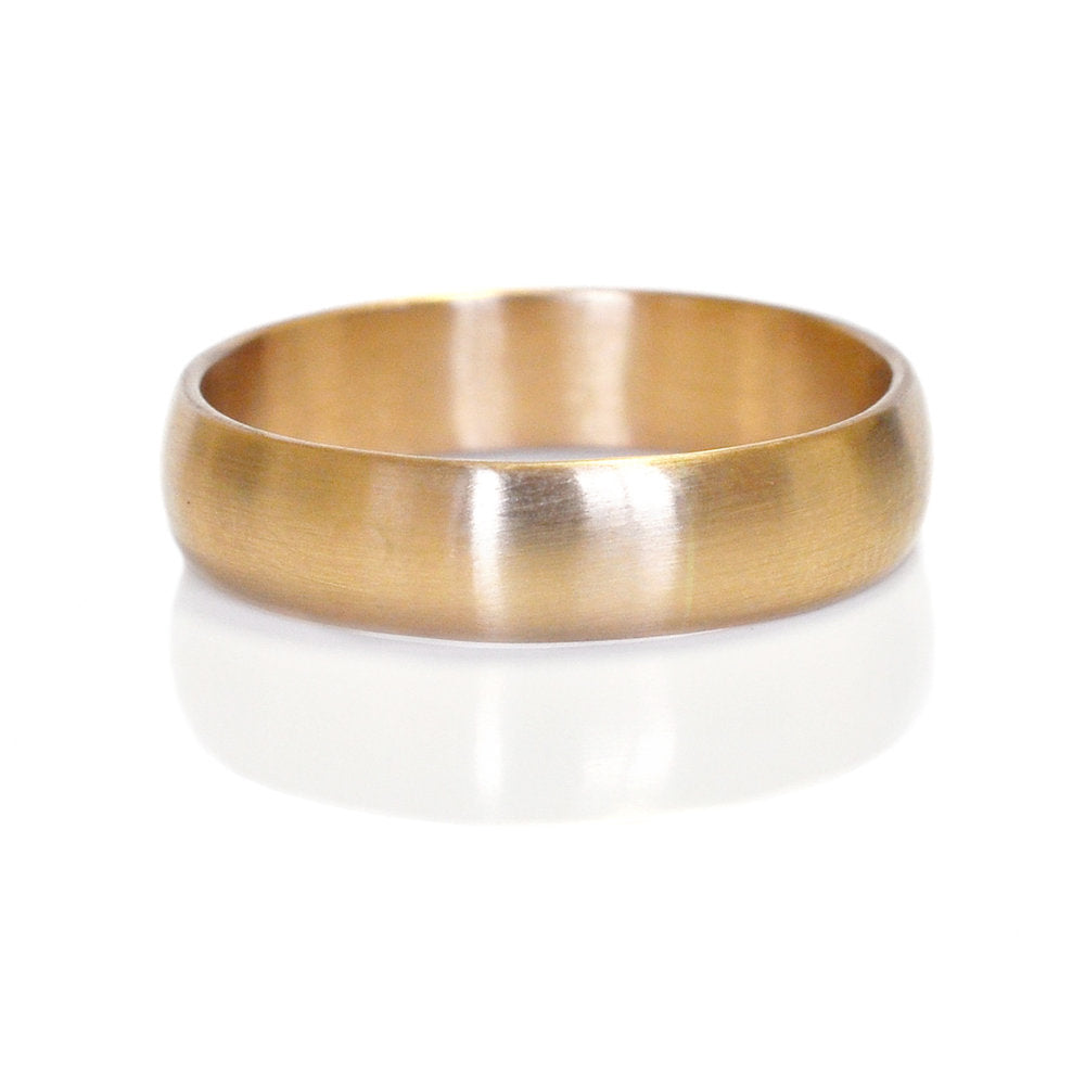 Yellow gold low dome band. Handmade with recycled metal by EC Design Jewelry in Minneapolis, MN.