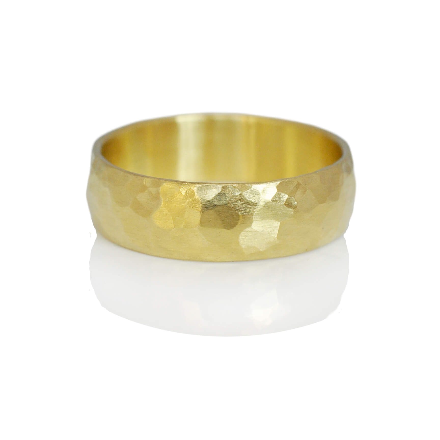 Facet hammered yellow gold wedding band. Handmade with recycled gold, by EC Design Jewelry in Minneapolis, MN..