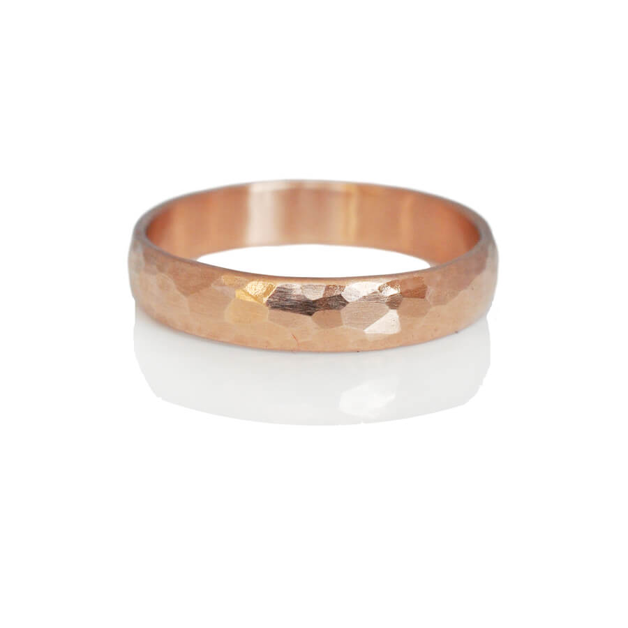 Wide hammered wedding band in red gold. Handmade with recycled metal by EC Design Jewelry in Minneapolis, MN.
