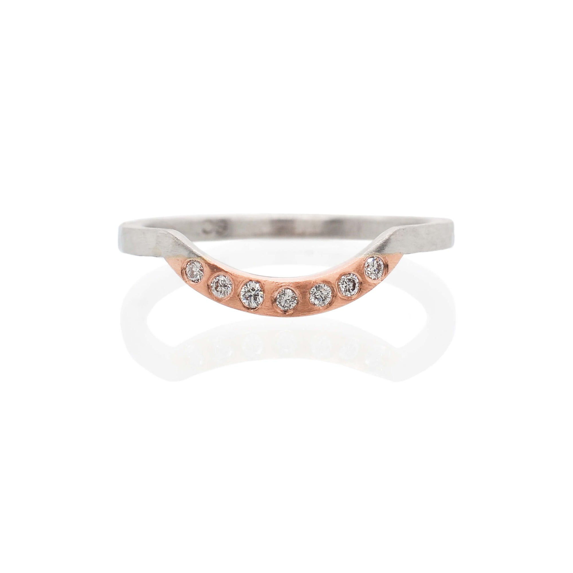Palladium and rose gold contour ring with flush set diamonds. Handmade by EC Design Jewelry in Minneapolis, MN using recycled metal and conflict-free stones.