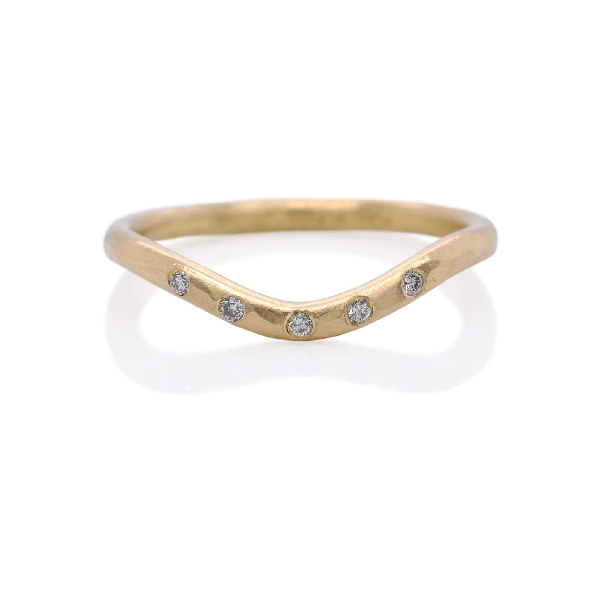 Contour diamond band in 14k yellow gold. Handmade by EC Design Jewelry in Minneapolis, MN using recycled metal and conflict-free stones.