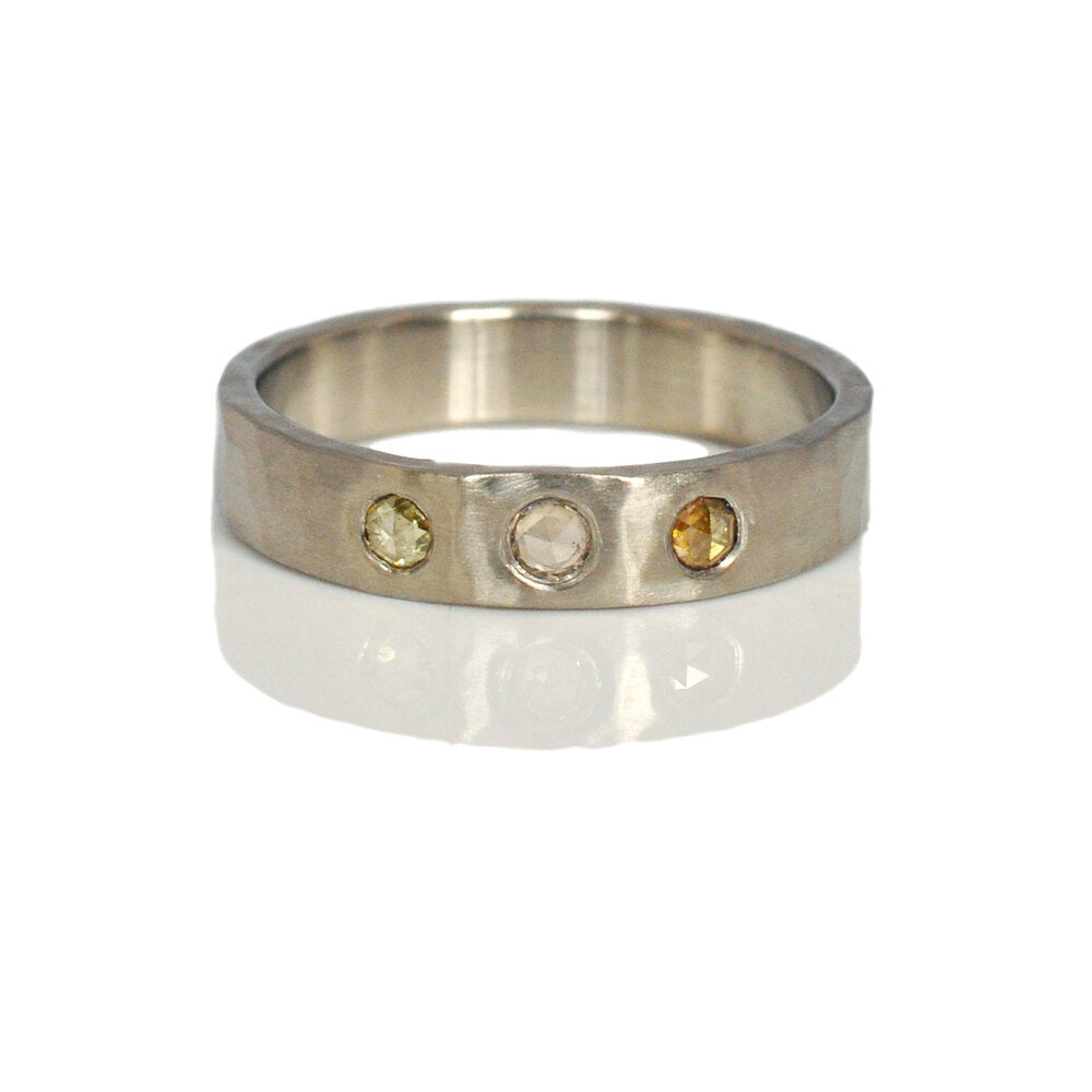 Diamond band in hammered palladium. Handmade with recycled metal and conflict-free stones.