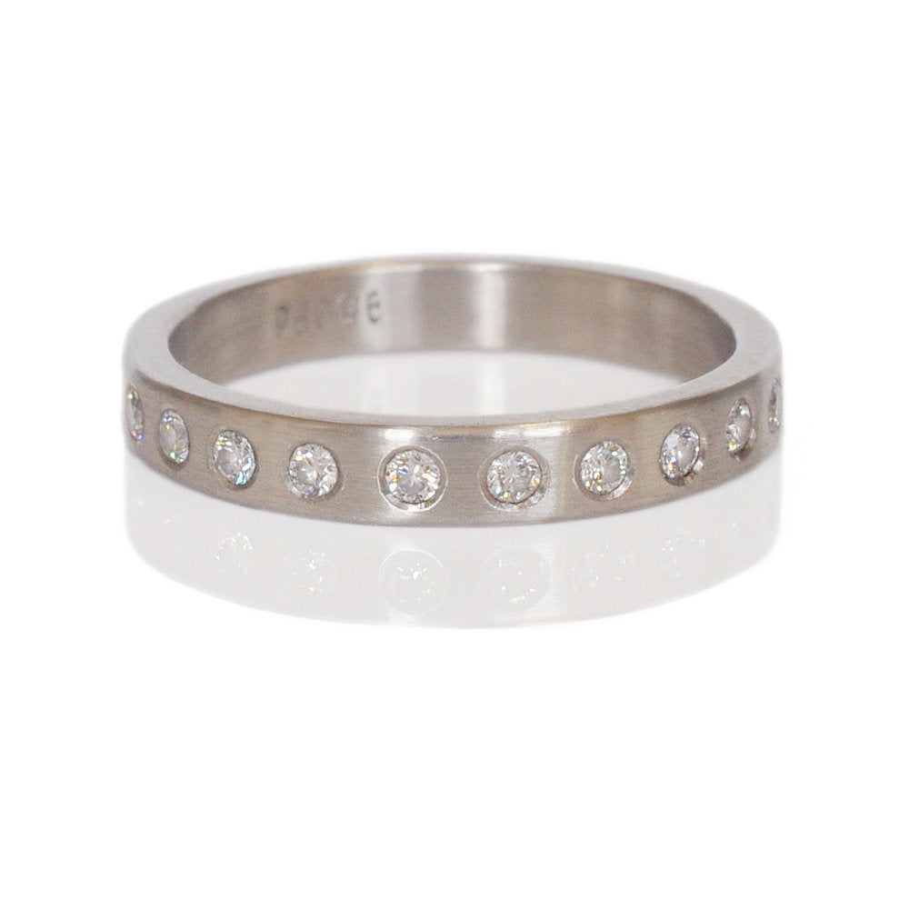 Handmade palladium and Canadian white diamonds eternity band. Ethically crafted with recycled metal and conflict-free stones. EC Design Studio, Minneapolis, MN.