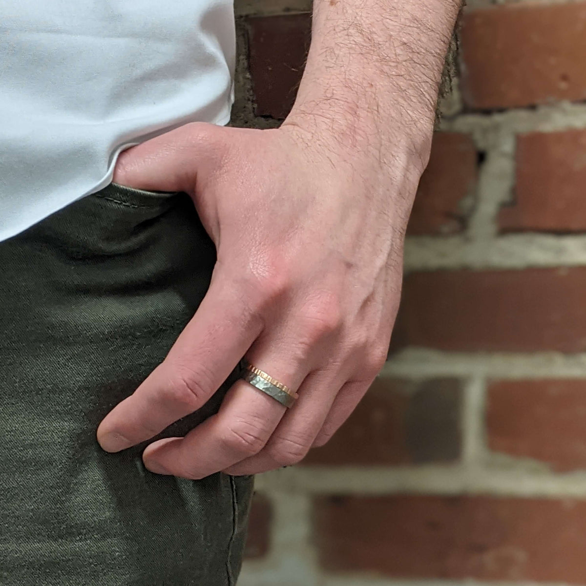 Hammered palladium and red gold wedding band. Handmade with recycled metal by EC Design Jewelry in Minneapolis, MN.
