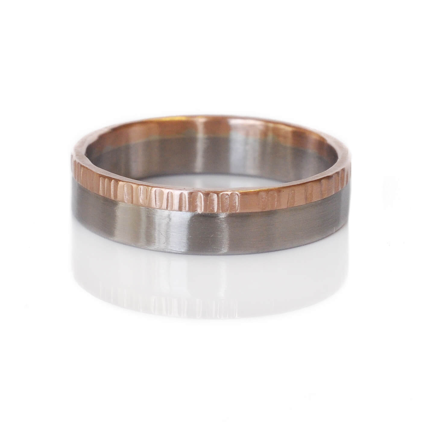 Handmade red gold and palladium wedding band. Made in Minneapolis, MN by EC Design Jewelry using recycled metal.
