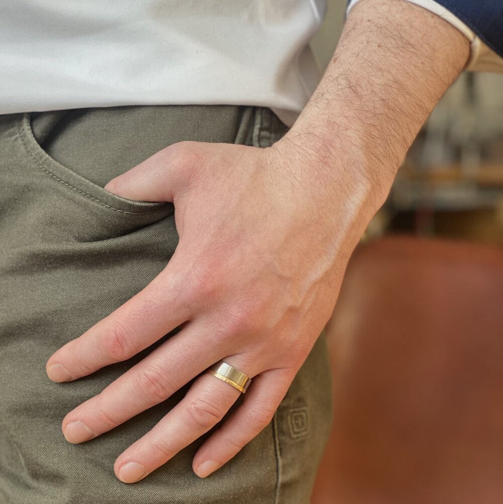 Yellow gold and palladium wedding band. Handmade by EC Design Jewelry in Minneapolis, MN using recycled metal.