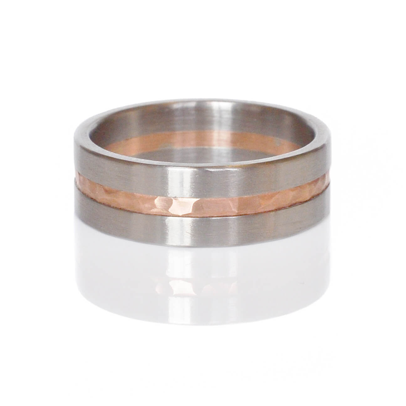 Handmade palladium and red gold mixed metal wedding band. Made by EC Design Studio in Minneapolis, MN using recycled metal.