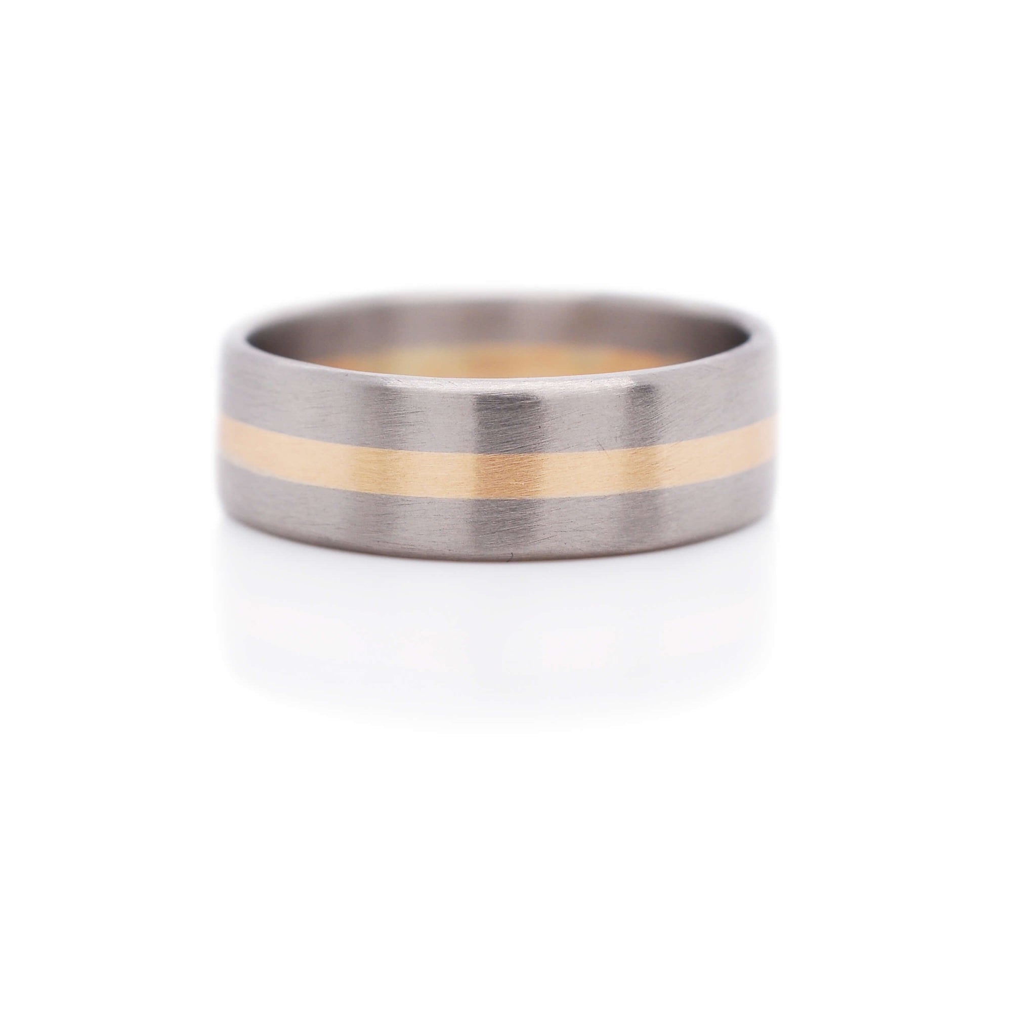 Palladium and yellow gold wedding band. Handmade by EC Design Jewelry in Minneapolis, MN using recycled metal.