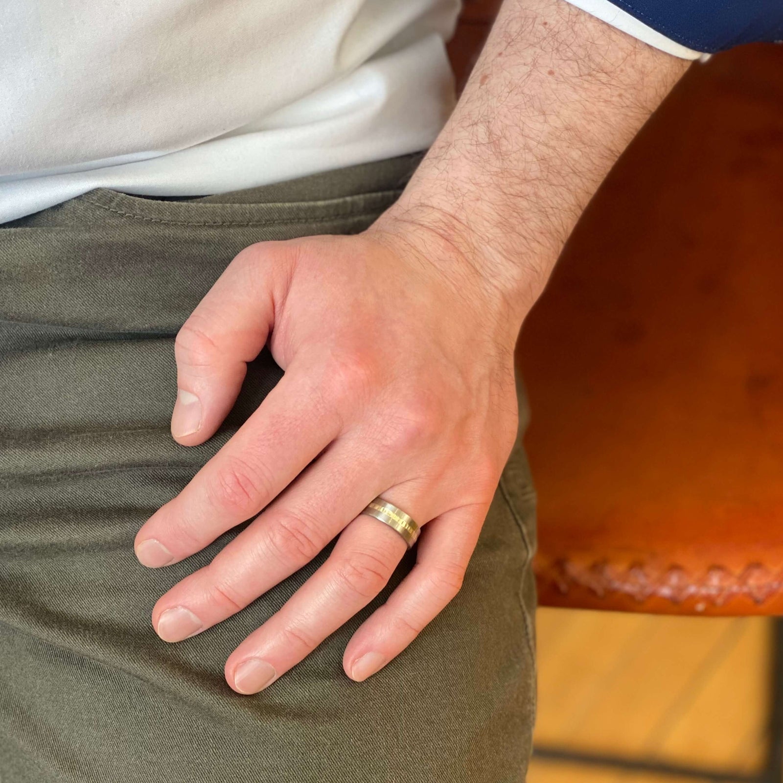 Handmade palladium and green gold mixed metal wedding band. Made by EC Design Studio in Minneapolis, MN using recycled metal.