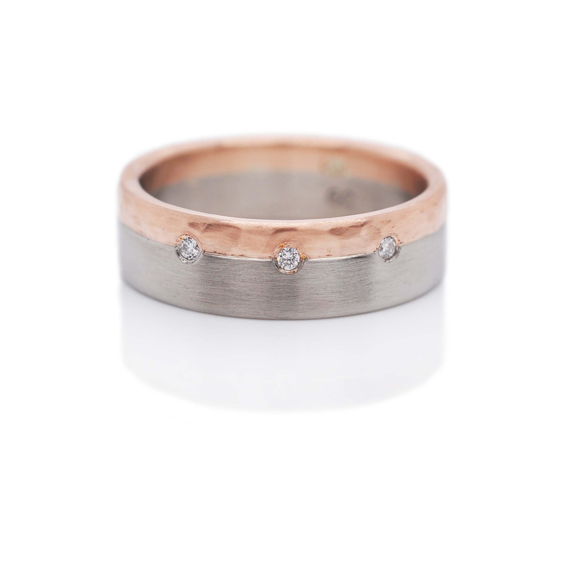 Rose gold and palladium diamond band from EC Design Jewelry in Minneapolis, MN.