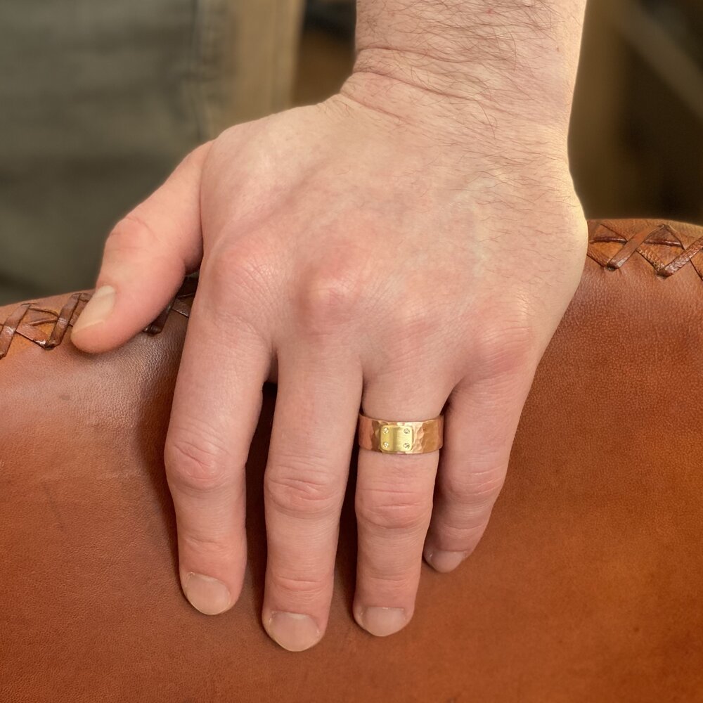 Red gold and yellow gold wide band with champagne diamond accents. Handmade by EC Design Jewelry in Minneapolis, MN using recycled metal.