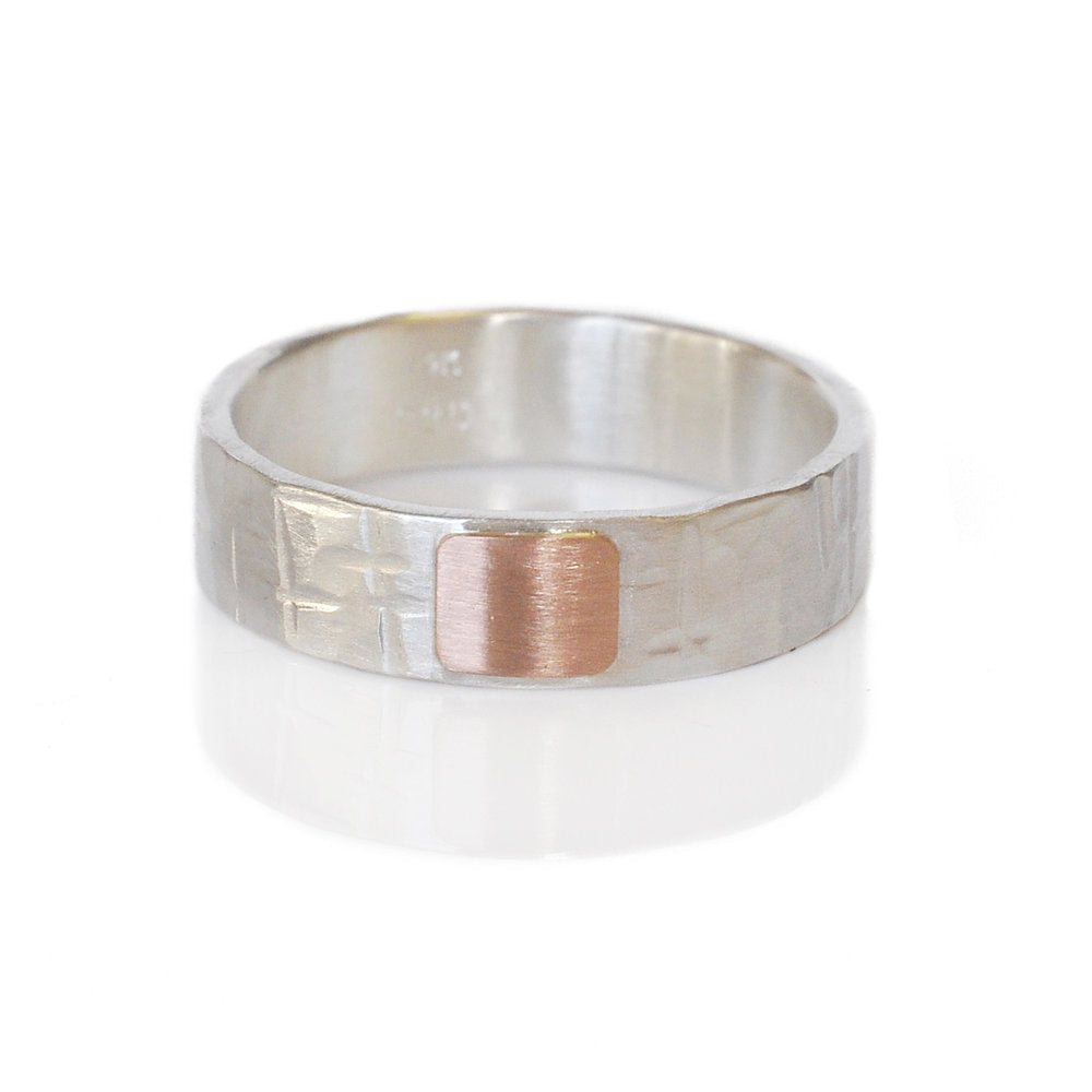 Red gold cell on a random hammered band of sterling silver. Handmade by EC Design Jewelry in Minneapolis, MN using recycled metal.