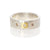 Sterling silver hammered band with yellow gold and diamond accents. Handmade by EC Design Jewelry in Minneapolis, MN.