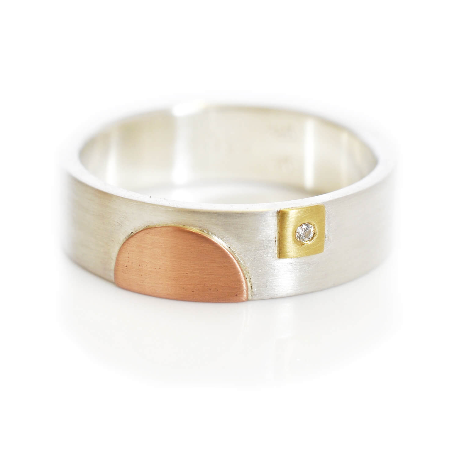 Sterling silver ring with rose gold, yellow gold, and diamond accent. Handmade by EC Design Jewelry in Minneapolis, MN using recycled metal and conflict-free stone.