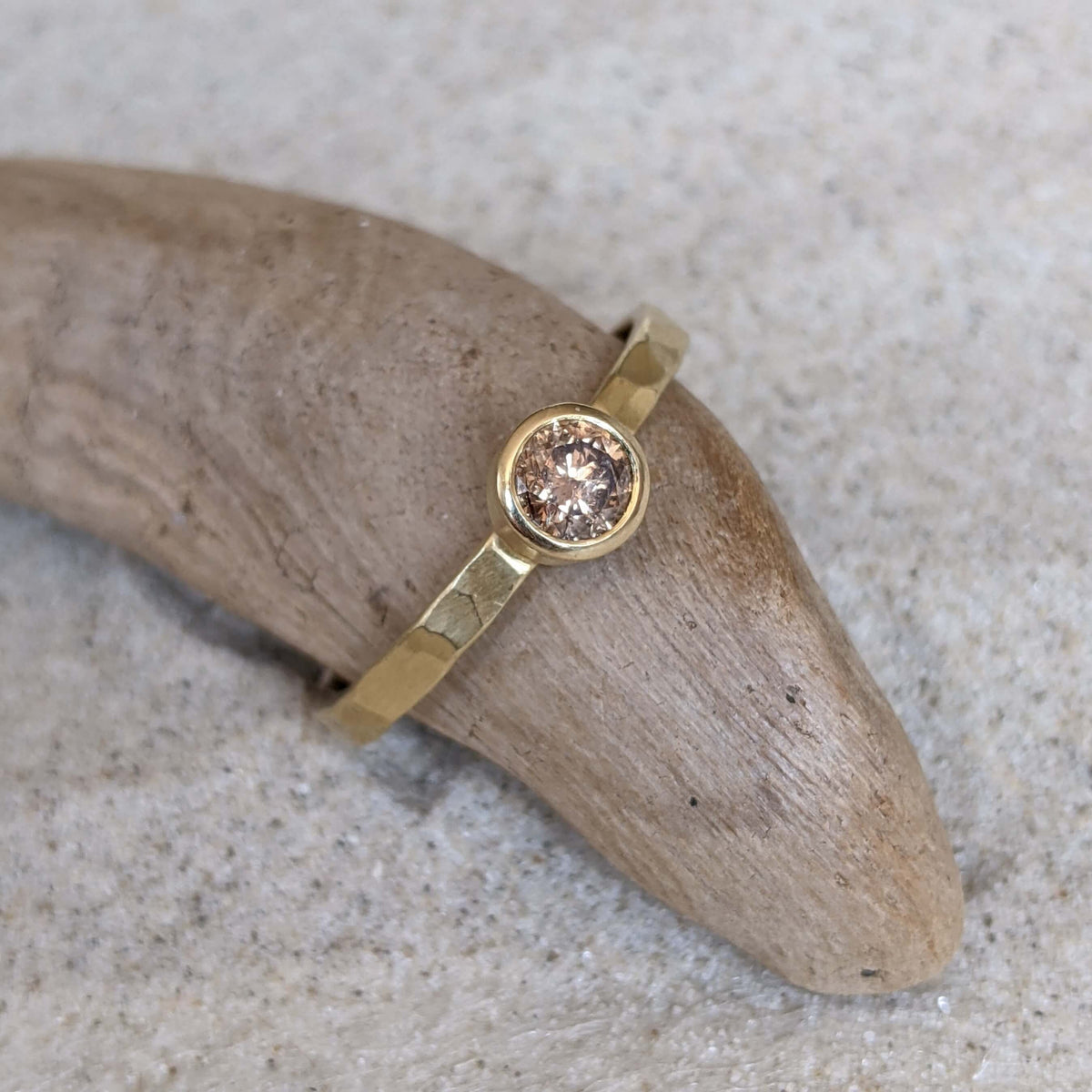 Alternative engagement ring with a brilliant cut champagne diamond in yellow gold. Handmade engagement rings from EC Design Studio in Minneapolis, MN.
