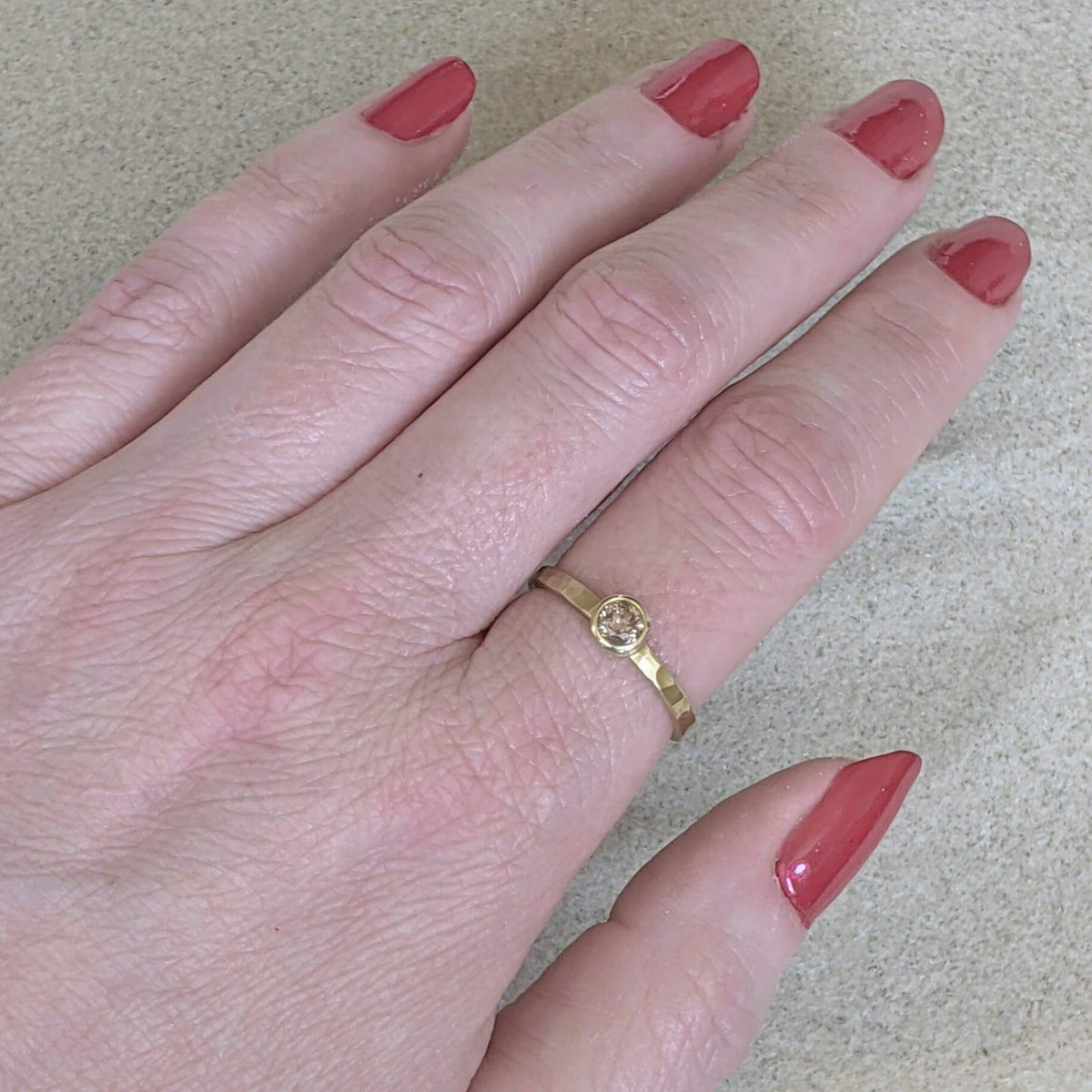 Brilliant cut champagne diamond in yellow gold. Handmade engagement rings from EC Design Studio in Minneapolis, MN.