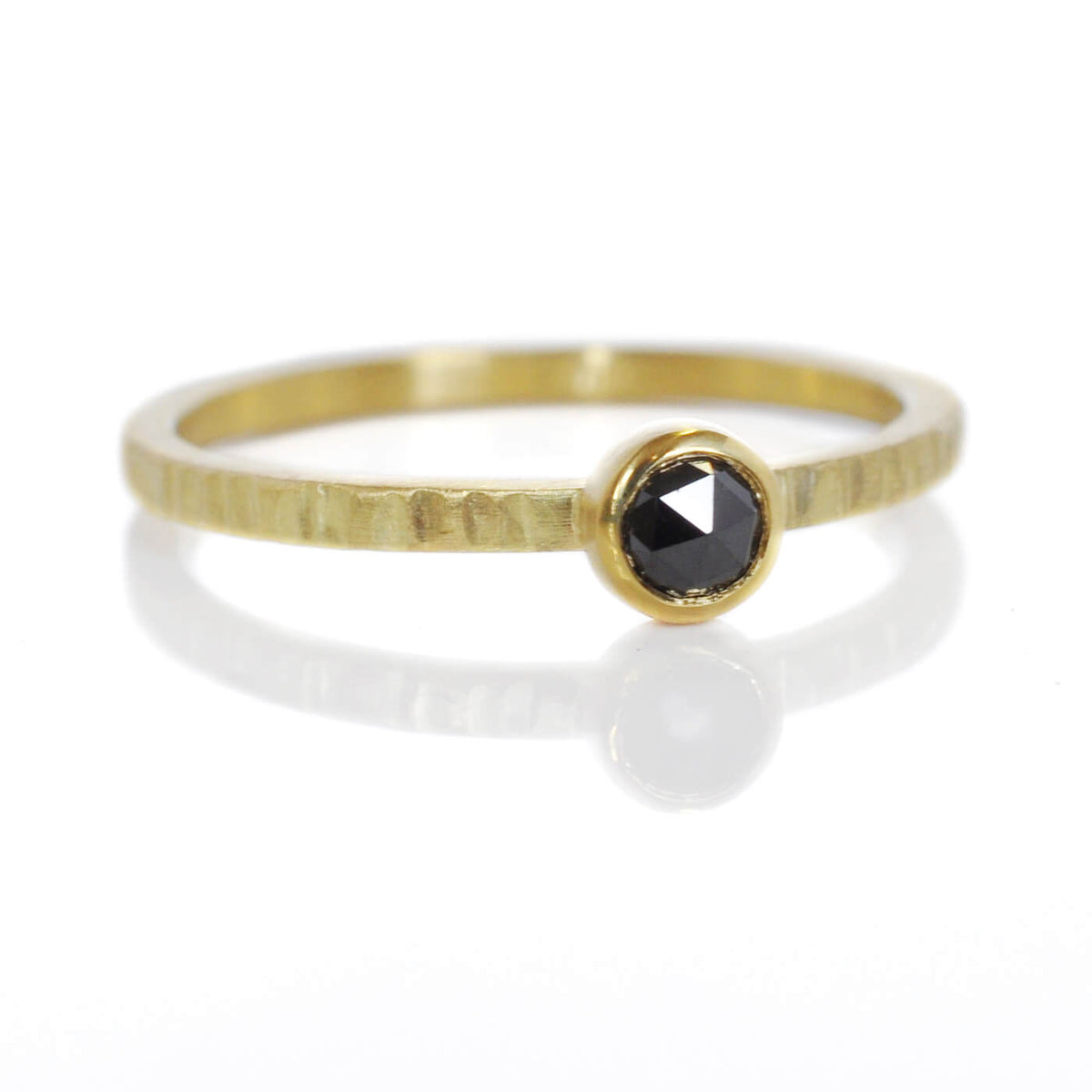 Delicate black diamond and yellow gold ring. Handmade by EC Design Studio in Minneapolis, MN using recycled metal and conflict-free stone.