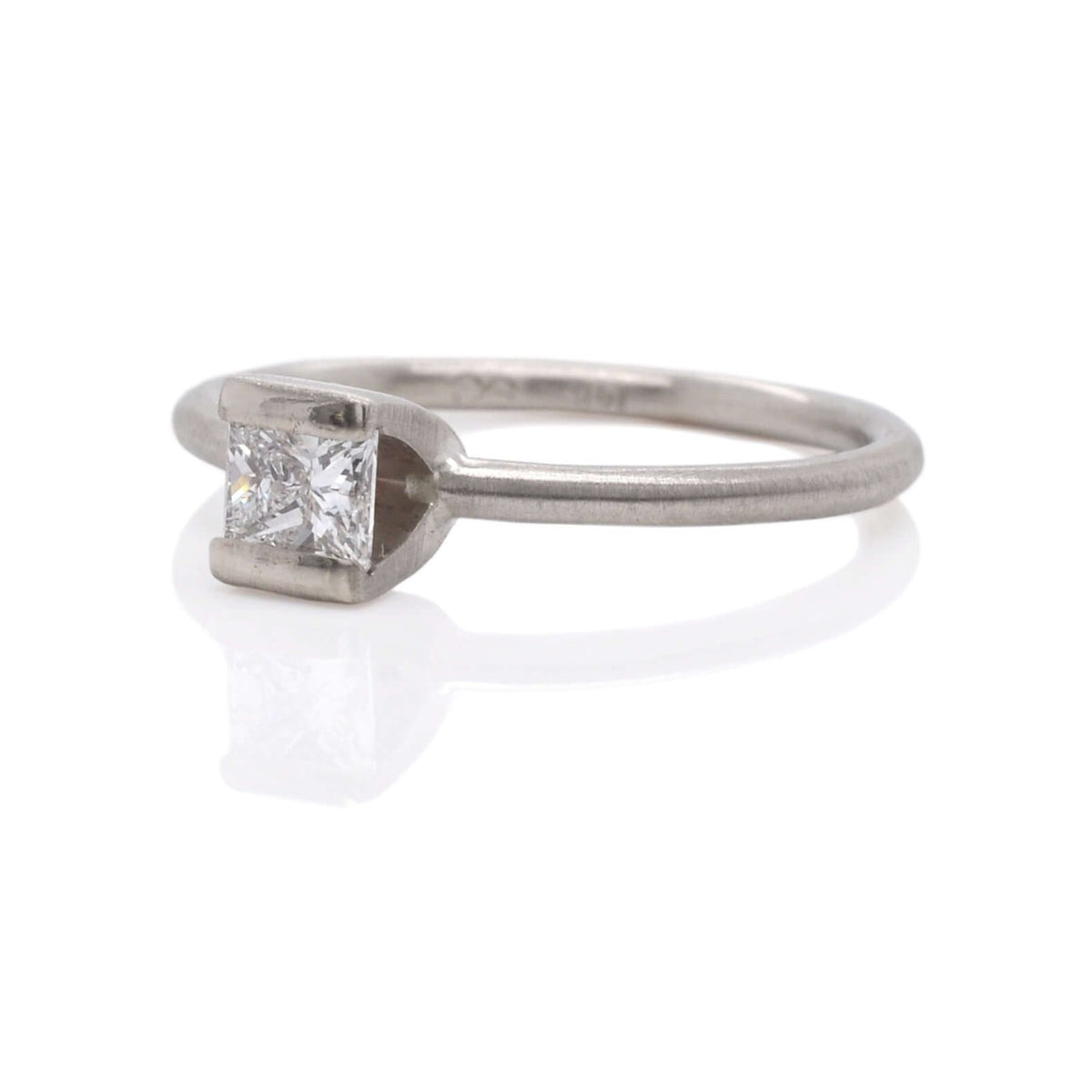 Diamond engagement ring in white gold. Handmade by EC Design Jewelry in Minneapolis, MN.
