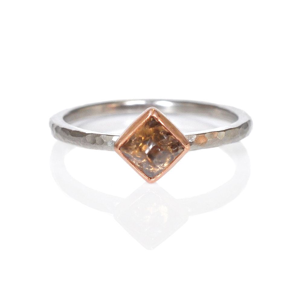 Half octahedron, raw champagne diamond bezel set in red gold on a palladium band. Handmade by EC Design Jewelry in Minneapolis, MN using recycled metal and conflict-free stone.