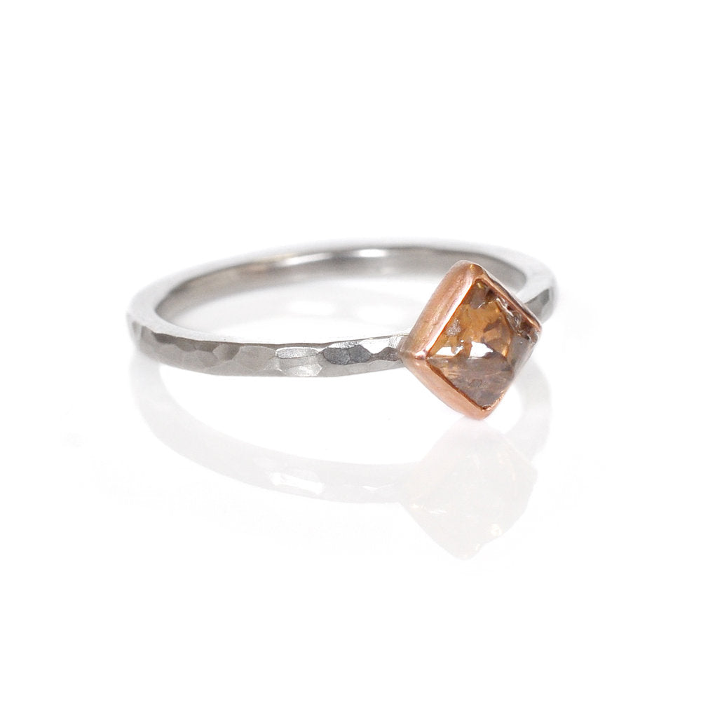 Half octahedron, raw champagne diamond bezel set in red gold on a palladium band. Handmade by EC Design in Minneapolis, MN using recycled metal and conflict-free stone.